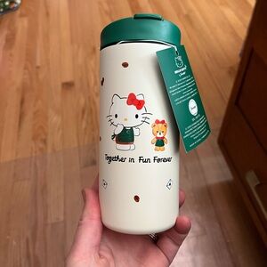 Starbucks Cream and Green Hello Kitty tumbler mug
